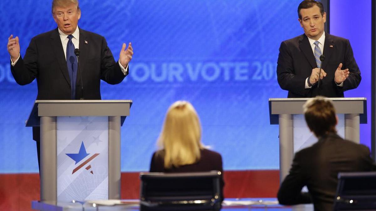 Republican presidential candidate, businessman Donald Trump and Republican presidential candidate, Sen. Ted Cruz, R-Texas, debate a question during a Republican presidential primary debate hosted by ABC News at the St. Anselm College Saturday, Feb. 6, 2016, in Manchester, N.H.