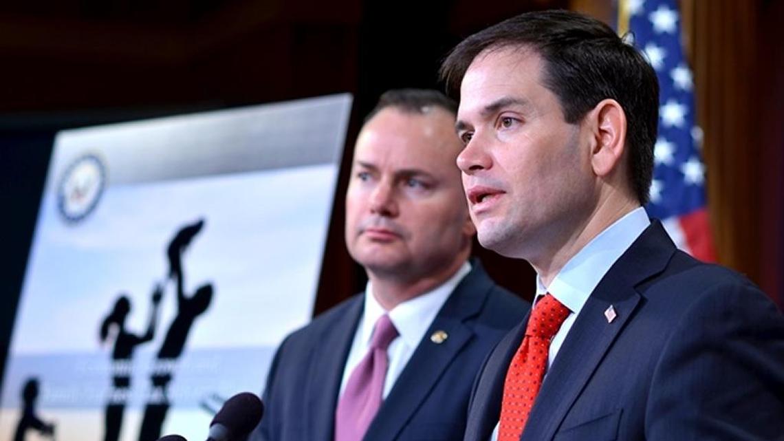 
U.S. Sens. Mike Lee of Utah and Marco Rubio of Florida discuss an overhaul of the nation's corporate and individual tax systems during a Washington press conference March 4, 2015. Their proposal, which has not yet formally been introduced to Congress, would cut corporate tax rates and flatten the number of individual tax brackets. 
