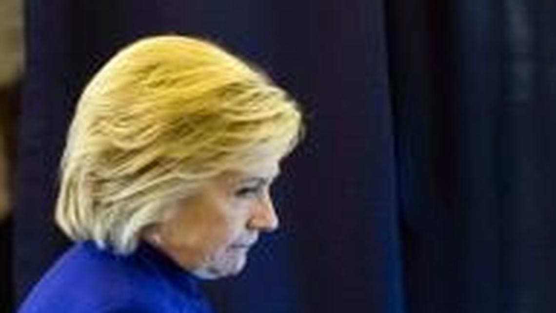 Democratic presidential candidate Hillary Clinton meets with members of her staff onboard her campaign plane en route to Westchester County Airport in White Plains, N.Y., from Florida, Wednesday, Sept. 21, 2016.