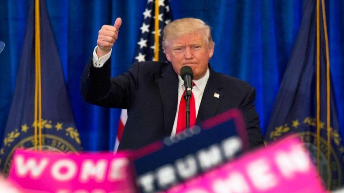 Republican presidential candidate Donald Trump acknowledges supporters during a campaign rally Friday.