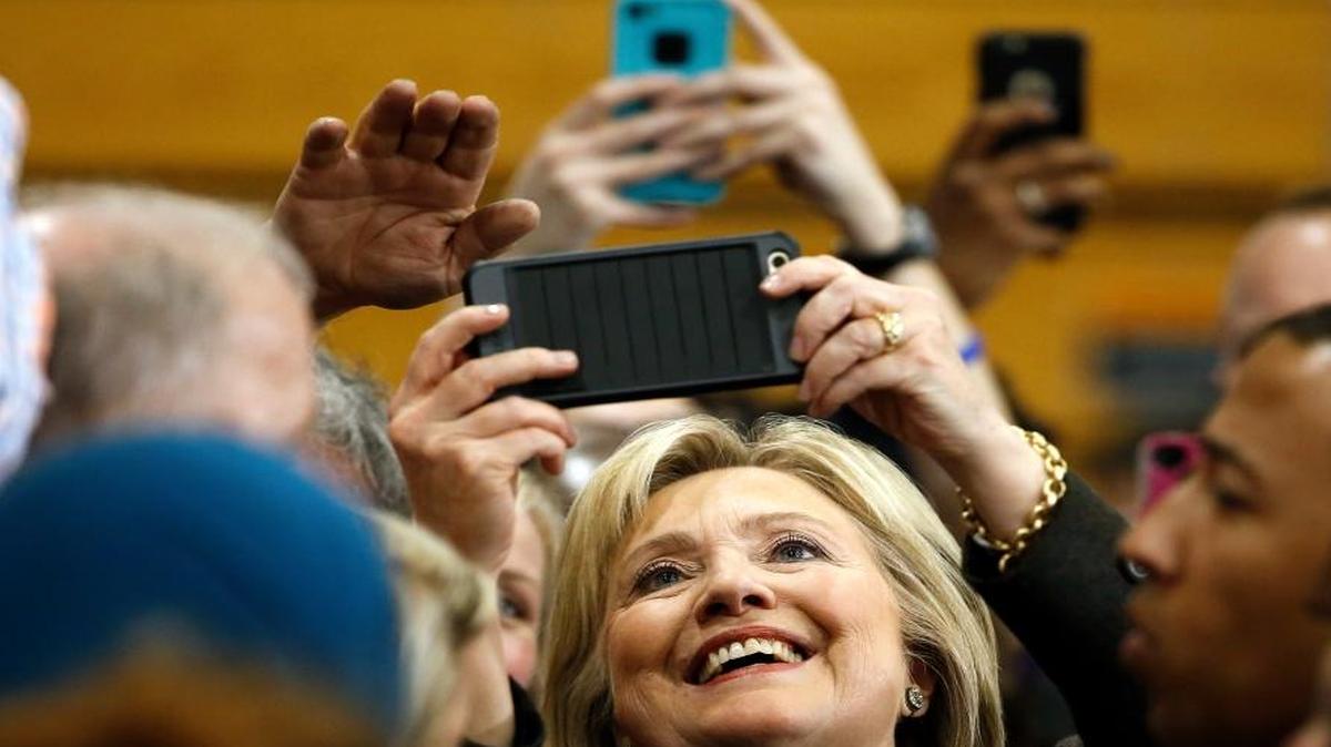 Democratic presidential candidate Hillary Clinton meets with attendees during a campaign stop, Wednesday, Feb. 3, 2016, in Manchester, N.H.