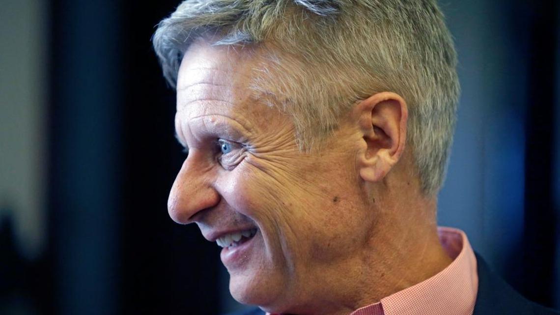 FILE - In this May 18, 2016 file photo, Libertarian presidential candidate, former New Mexico Gov. Gary Johnson speaks with legislators at the Utah State Capitol in Salt Lake City. The day after political heavyweight Mitt Romney name-dropped him on Twitter, the former New Mexico governor seemed to reveal a hole in his foreign-affairs knowledge when he was befuddled by an otherwise routine question about the Syrian city of Aleppo.