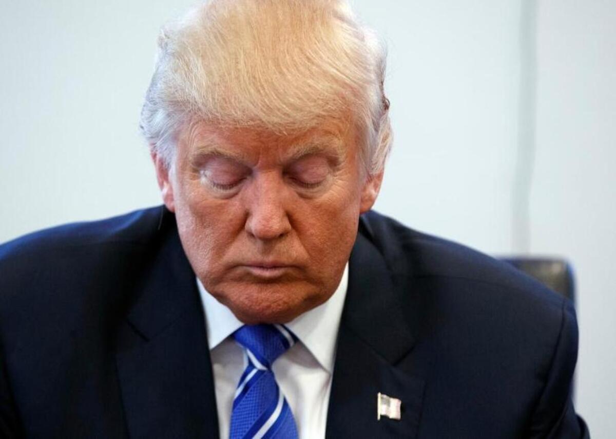 Republican presidential candidate Donald Trump pauses during a meeting with members of the National Border Patrol Council at Trump Tower, Friday, Oct. 7, 2016, in New York.