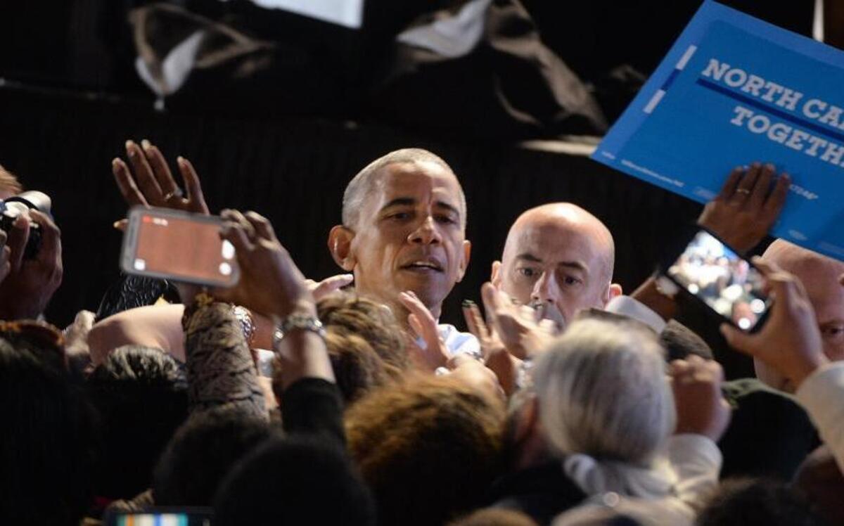 In Greensboro, North Carolina, President Barack Obama works the rope line after stumping for Democratic presidential nominee Hillary Clinton on Tuesday, Oct. 11, 2016. Recently, Obama recorded endorsements for two down-ballot Democrats to run in upcoming TV and radio ads. Obama is lending his support to U.S. Senate hopeful Deborah Ross and gubernatorial nominee Roy Cooper.