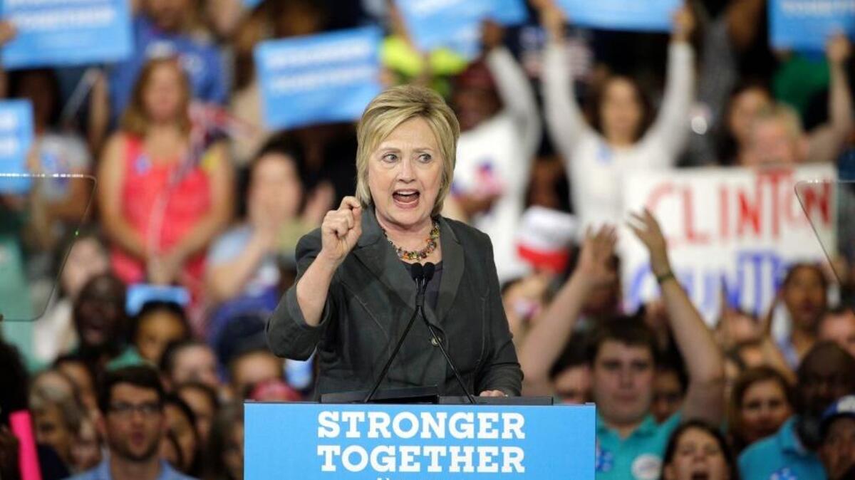 FILE - In this June 22, 2016 file photo, Democratic presidential candidate Hillary Clinton speaks in Raleigh, N.C. Public confidence in presumptive Republican presidential nominee Donald Trump is in the single digits in nearly half of the countries surveyed in a new poll that examines international attitudes toward the United States.
