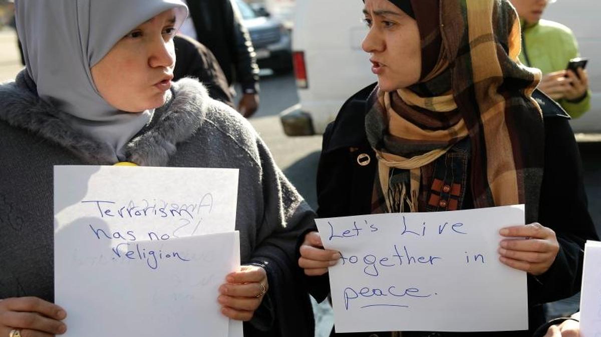 Three Muslim women were among those protesting what advocacy groups say is a spike in anti-Muslim incidents across the United States fueled by the incendiary rhetoric of Donald Trump and others. At a news conference in Queens, New York, Muslim advocates say they fear further harassment and violence.