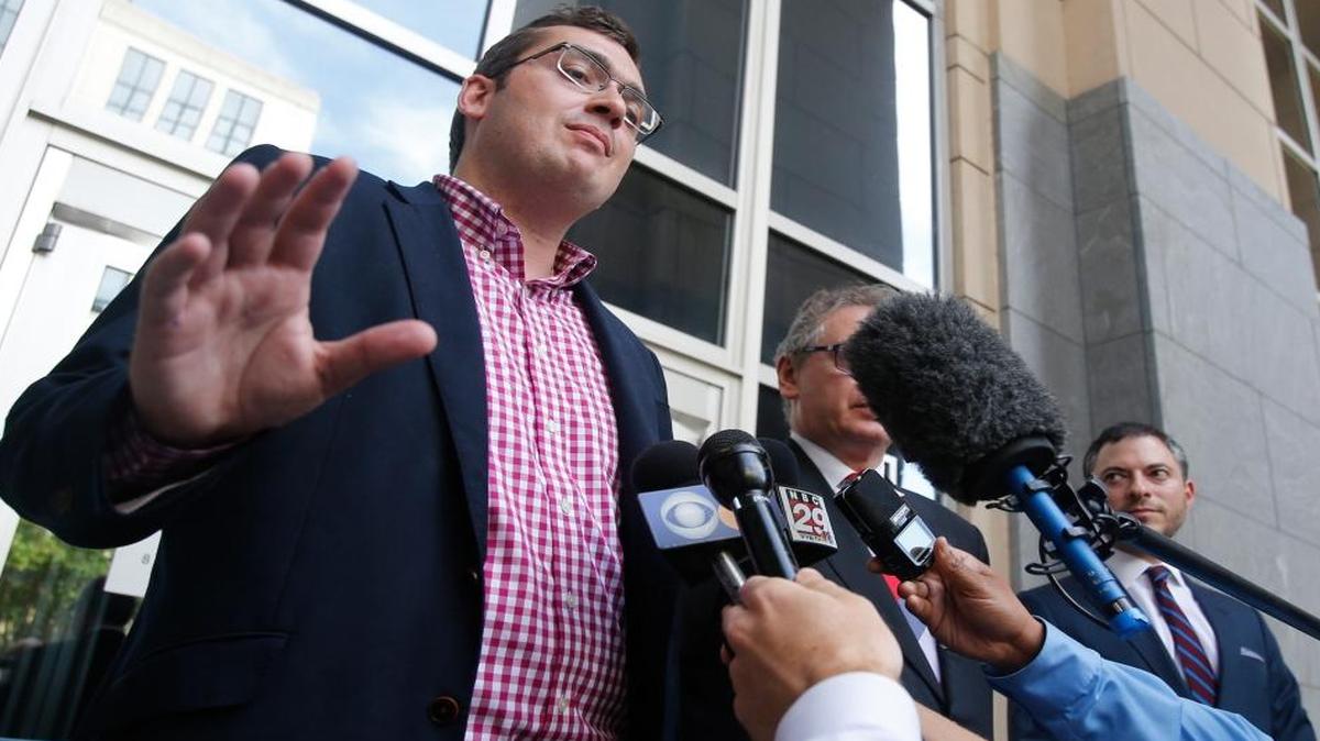 Virginia delegate to the Republican National Convention Carroll Correll Jr., left, talks with the media after a hearing on his lawsuit at federal court in Richmond, Va. Correll wants to avoid voting for presumptive nominee Donald Trump at the party convention.