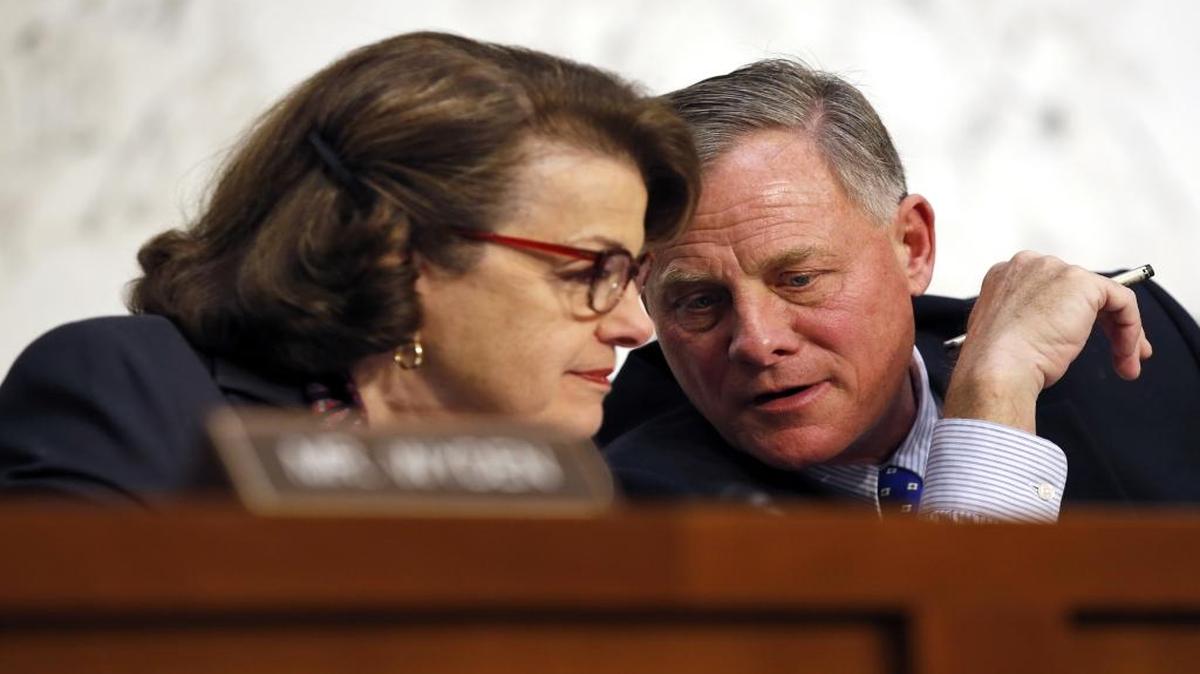 Chairman Sen. Richard Burr, R-N.C., and Vice Chairman Sen. Dianne Feinstein, D-Calif., talk during a hearing of the Senate Select Committee on Intelligence about worldwide threats, on Capitol Hill in Washington on Feb. 9, 2016.