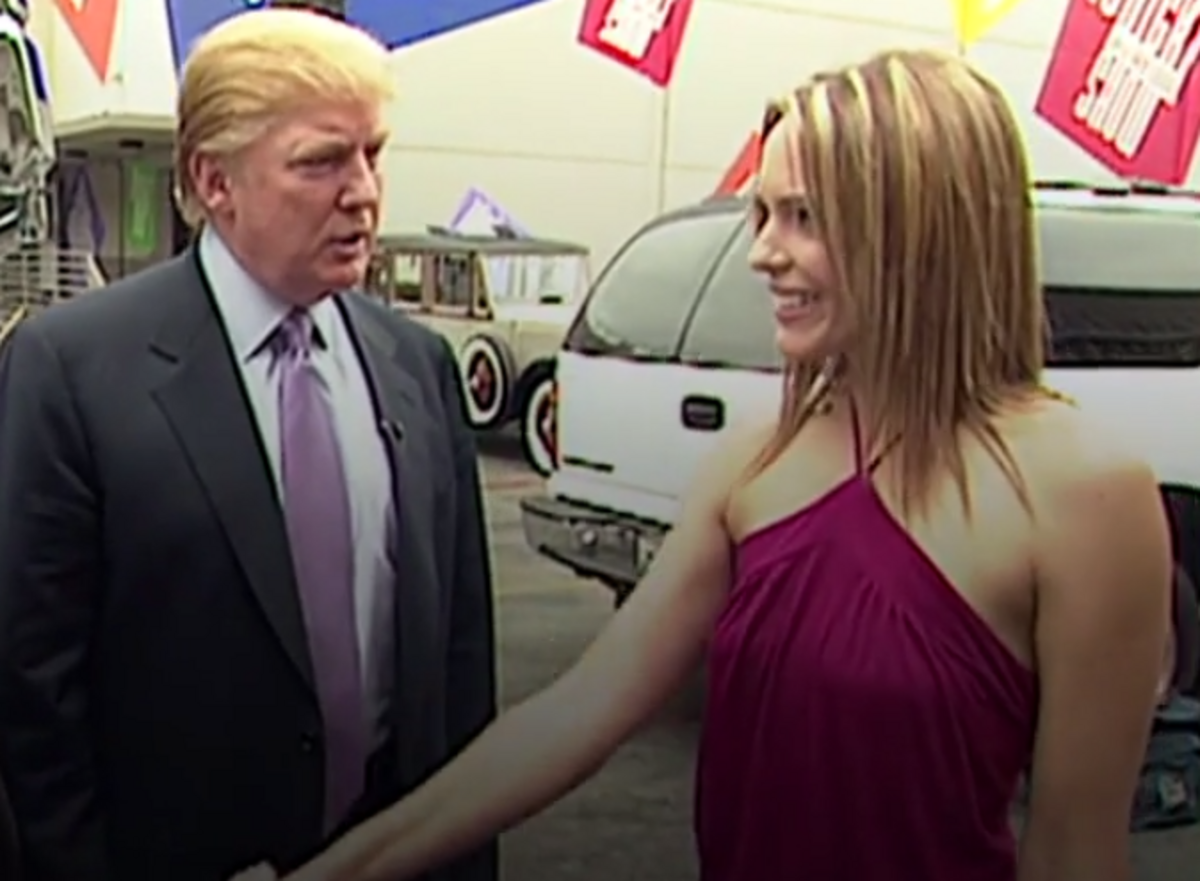 Billy Bush (left) and Donald Trump (center) meet actress Arianne Zucker in 2005 before Trump’s cameo on soap opera “Days of Our Lives.”