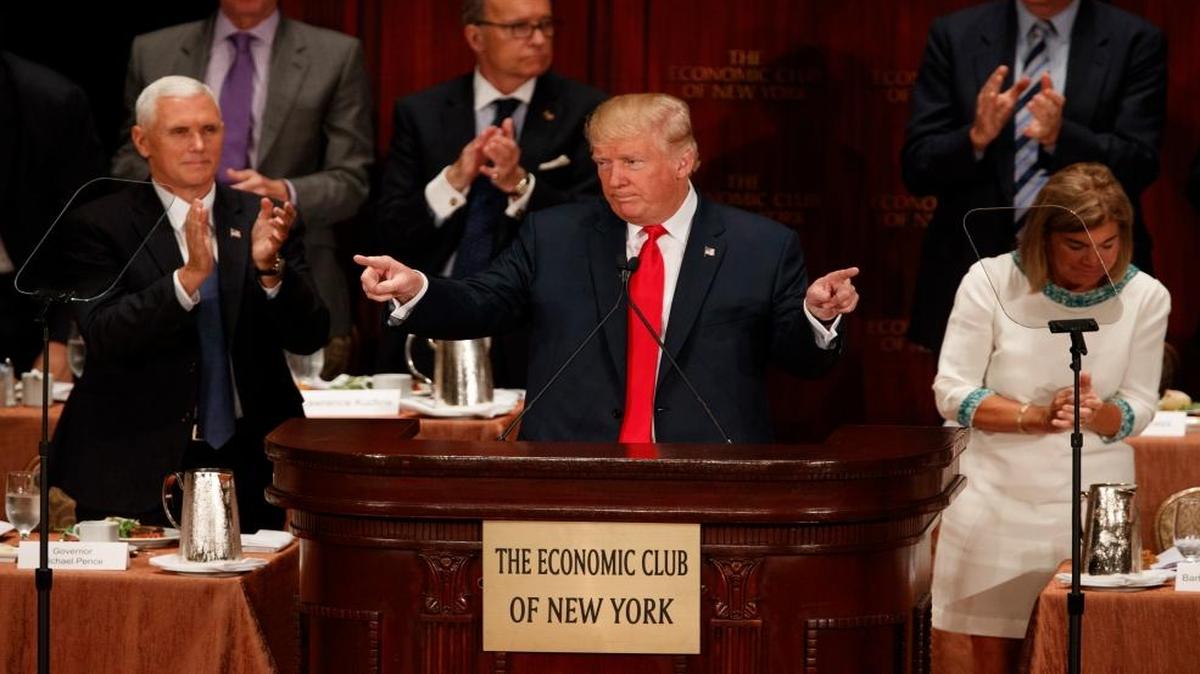 Republican presidential candidate Donald Trump speaks to the Economic Club of New York on Thursday, Sept. 15, 2016, in New York. Republican vice presidential candidate Mike Pence applauds at left.