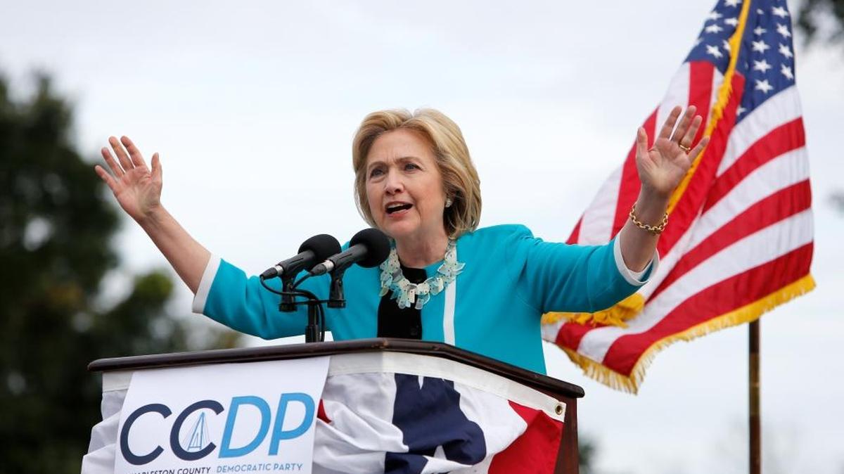 Democratic presidential candidate Hillary Rodham Clinton speaks to the crowd at the Jenkins Orphanage in North Charleston, S.C., Saturday, Nov. 21, 2015, during the Blue Jamboree event. (AP Photo/Mic Smith)