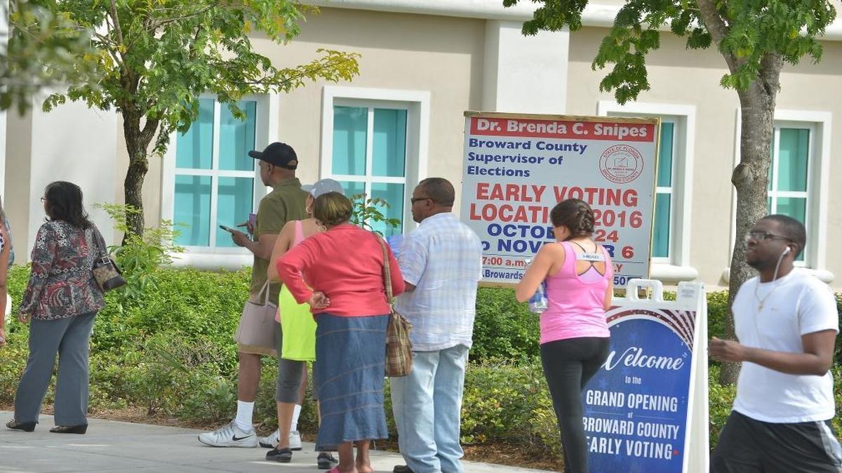 Voters line up to cast their ballots early at Broward County library’s Miramar Branch on Monday, Oct. 24, 2016, in Miramar, Florida.
