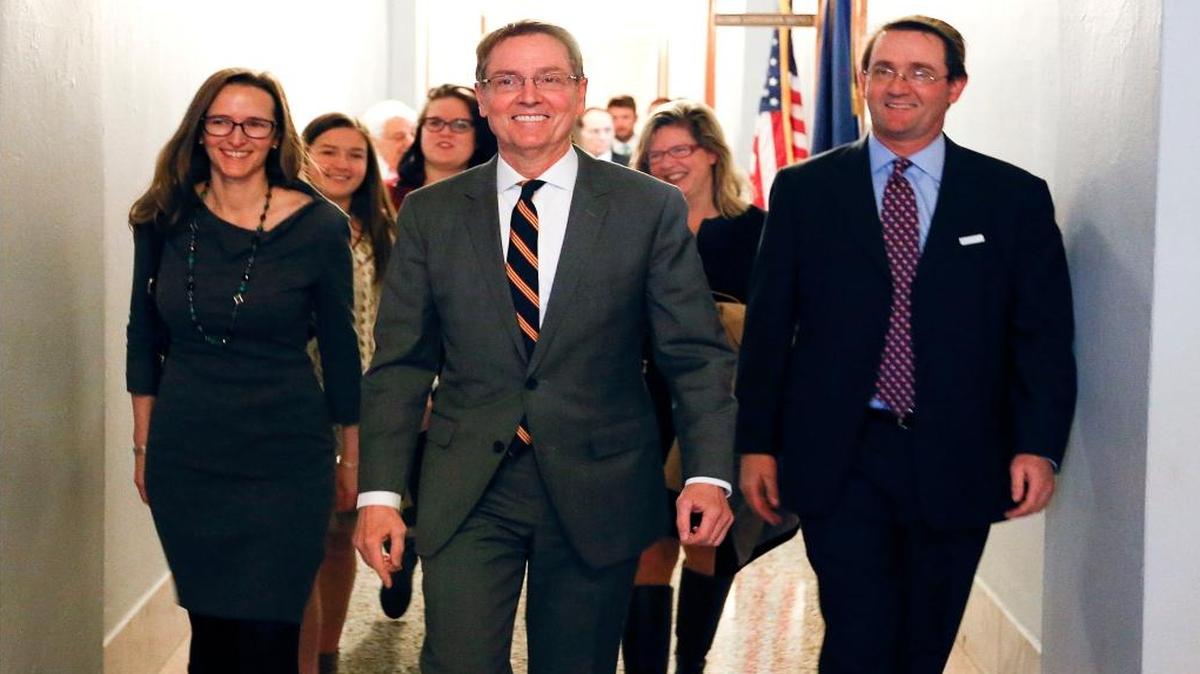 Lexington Mayor Jim Gray, center, filed papers to run for the U.S. Senate in the secretary of state office at the State Capitol in Frankfort, Ky., on Tuesday, Jan. 26, 2016. Gray, a Democrat, is challenging Republican U.S. Sen. Rand Paul.