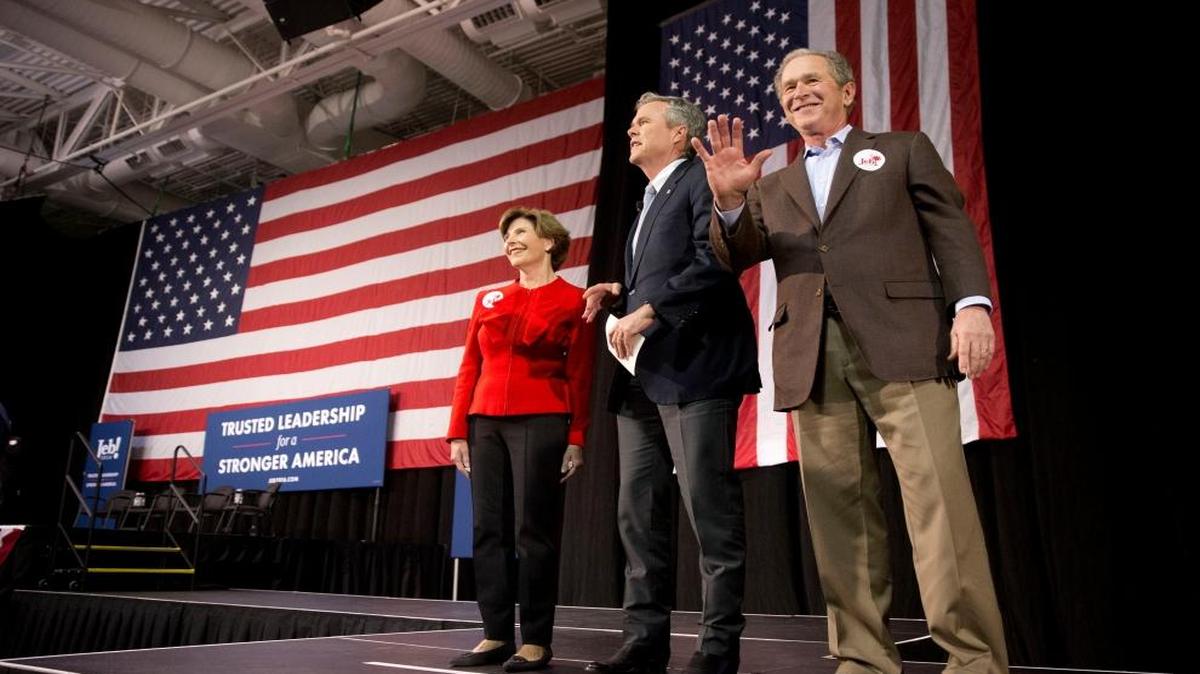 Republican presidential candidate and former Florida Gov. Jeb Bush, accompanied by his brother former President George W. Bush and George's wife Laura Bush, takes the stage during a campaign stop Monday, Feb. 15, 2016, in North Charleston, S.C.