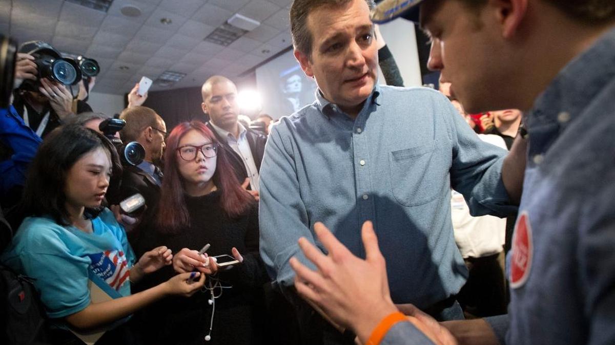 Republican presidential candidate Sen. Ted Cruz, R-Texas speaks to a supporter during a campaign event, Saturday in Ames, Iowa.