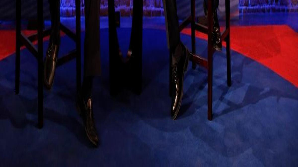 Republican presidential candidate Ben Carson talks with Anderson Cooper during a commercial break at a CNN town hall event, Tuesday, Feb. 16, 2016, in Greenville, S.C.