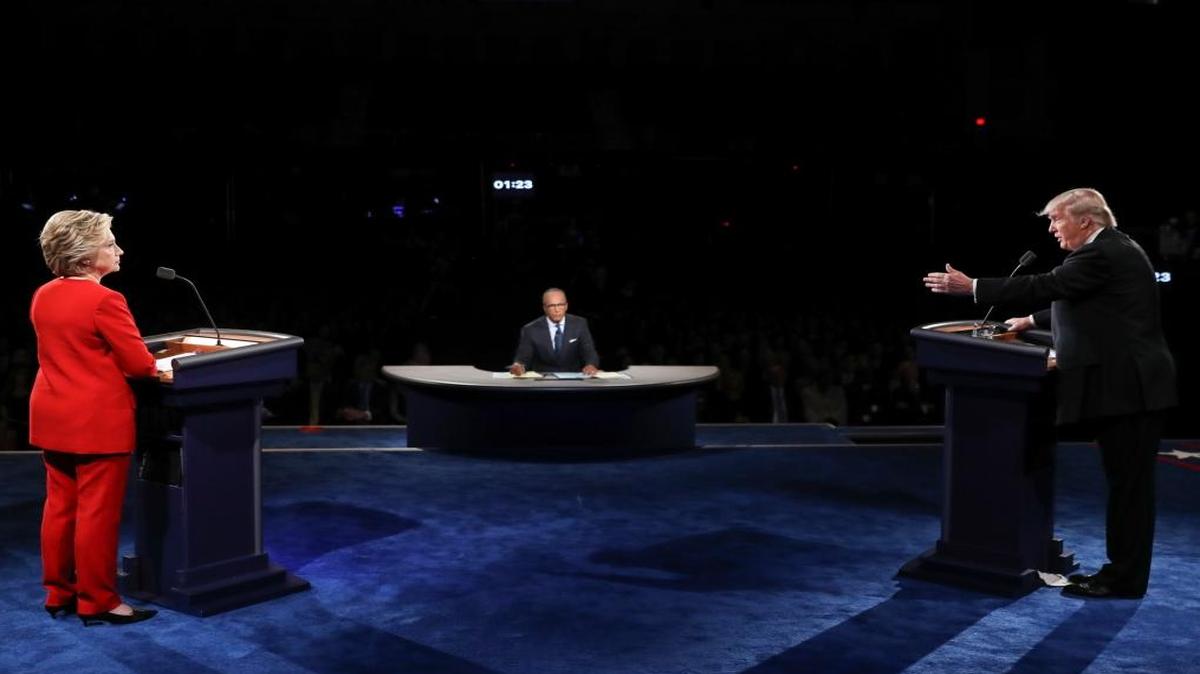 Republican presidential nominee Donald Trump points toward Democratic presidential nominee Hillary Clinton during the presidential debate at Hofstra University in Hempstead, N.Y., Monday, Sept. 26, 2016.