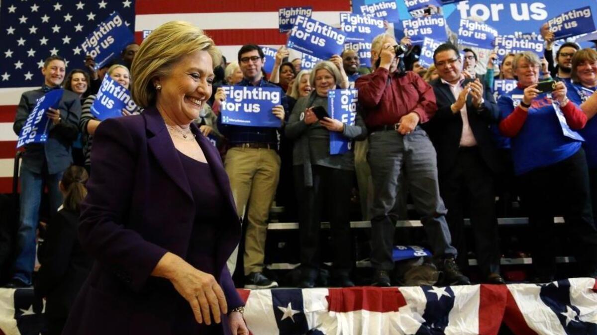 Democratic presidential candidate Hillary Clinton smiles as she arrives at a campaign event, Tuesday, Feb. 2, 2016, in Nashua, N.H.