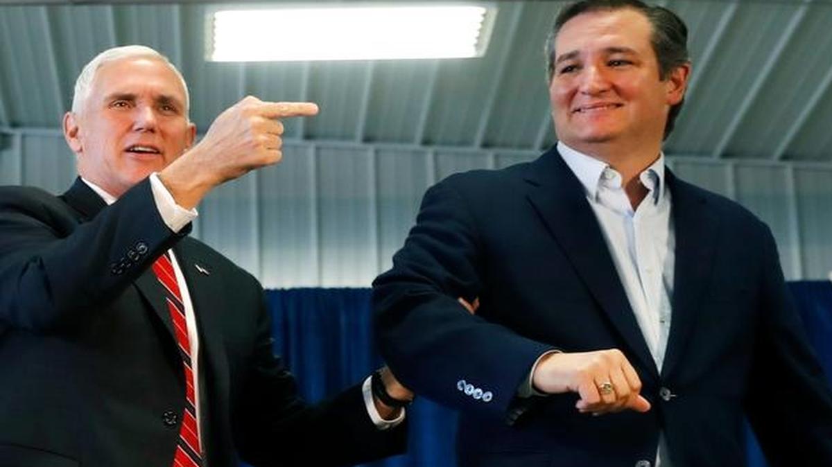 Republican vice presidential candidate, Indiana Gov. Mike Pence, with Sen. Ted Cruz, R-Texas, during a campaign rally Thursday in Prole, Iowa.