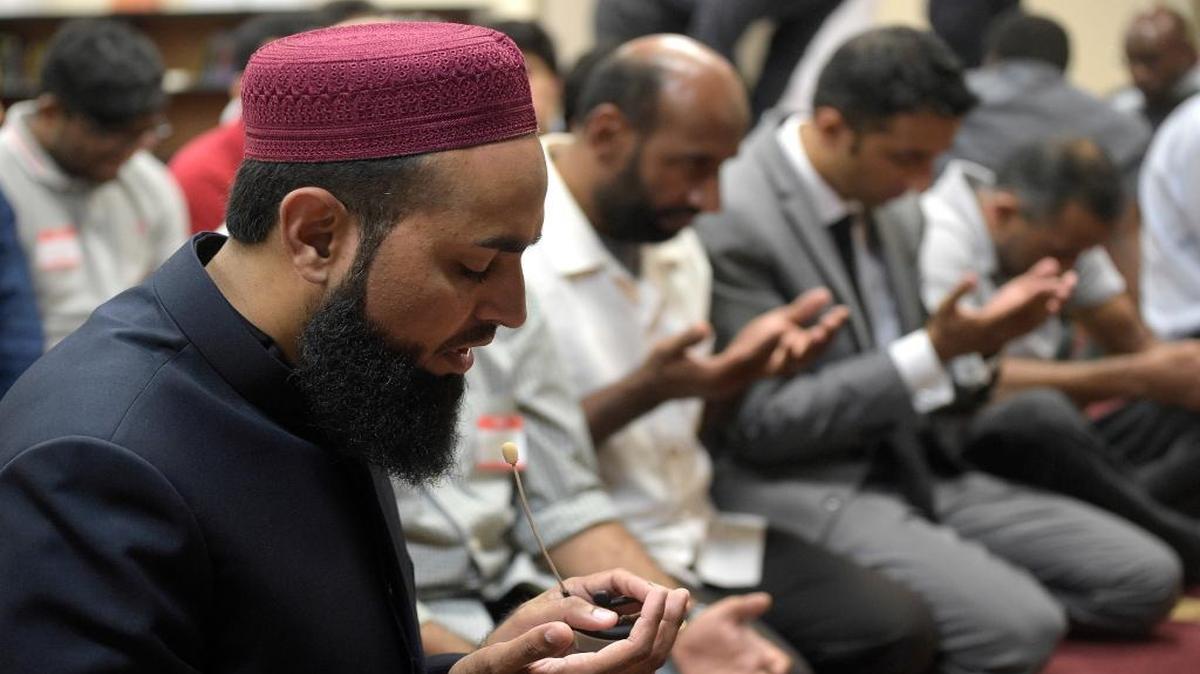 Imam Azhar Subedar, left, speaks during a special prayer with non-Muslim members after the mass shooting at the Pulse Orlando nightclub. A McClatchy-Marist Poll found that Democrats overwhelmingly backed the idea of strengthening ties with American Muslims to combat terrorism, while Republicans split equally between that and closer scrutiny of the Muslim community.