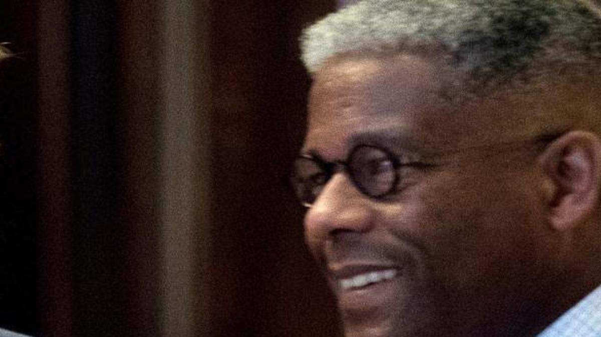 Michael Flynn, President-elect Donald Trump's nominee for National Security adviser, left, speaks with former Rep. Allen West, R-Fla., right, at Trump Tower, Monday, Dec. 5, 2016, in New York.