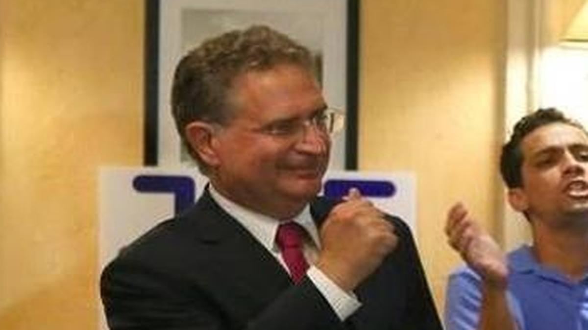 Former U.S. Rep. Joe Garcia, left, celebrated his primary victory with supporters at La Carreta restaurant in West Kendall. His win set up a rematch with Rep. Carlos Curbelo, who defeated him in 2014.