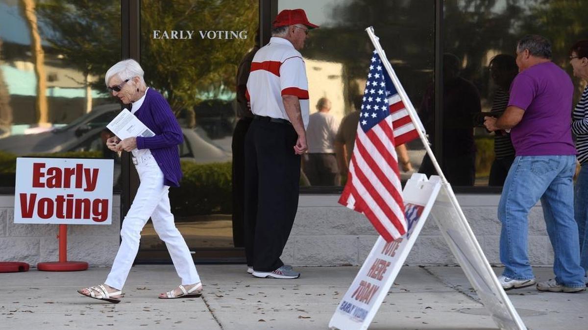 Early voters cast their ballots at the Supervisor of Elections office on 301 Boulevard in Bradenton, Fla., Monday, Oct. 24, 2016.