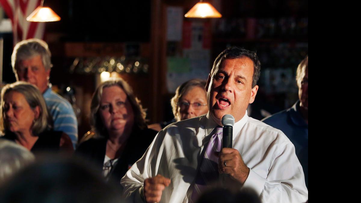 
Republican presidential candidate New Jersey Gov. Chris Christie speaks during a town hall meeting in Keene, N.H. Christie has been lagging in state polls, and Tuesday blasted a home state pollster.
