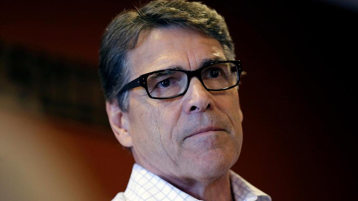 
FILE- In this July 13, 2015 file photo, Republican presidential candidate former Texas Gov. Rick Perry speaks during a meet and greet with local residents, in Fort Dodge, Iowa. 
