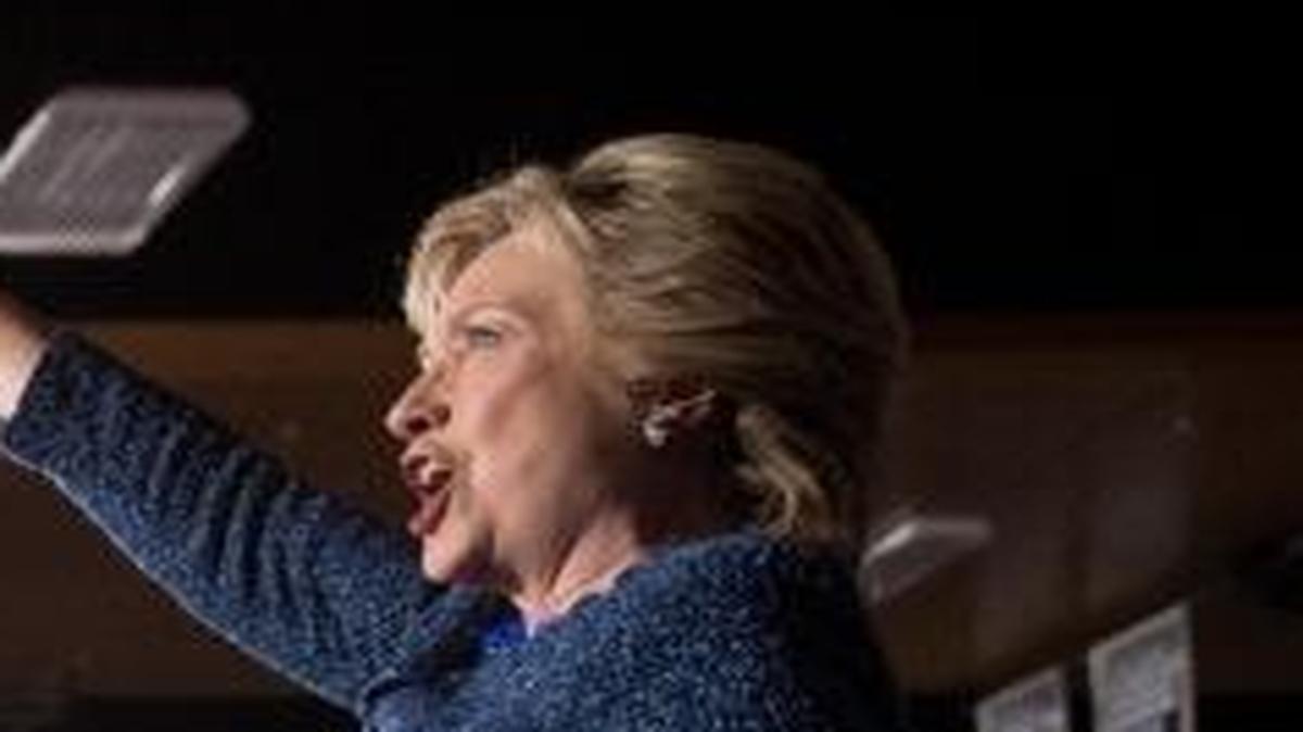 Democratic presidential candidate Hillary Clinton takes the stage at a rally at Theodore Roosevelt High School in Des Moines, Iowa, Friday, Oct. 28, 2016.