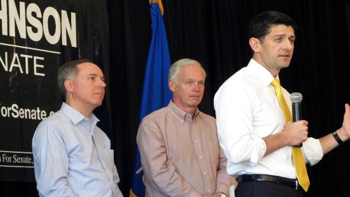 House Speaker Paul Ryan joins Wisconsin state Assembly Speaker Robin Vos, left, and Sen. Ron Johnson, R-Wis., center, at a campaign rally for Johnson on Thursday, May 5, 2016, in Burlington, Wis. Ryan is refusing to support Donald Trump as the Republican nominee for president, insisting Thursday that the businessman must do more to unify the GOP. The surprise declaration from Ryan on CNN's "The Lead" amounted to a stunning rebuke of Trump from the Republican Party's highest-ranking officeholder.
