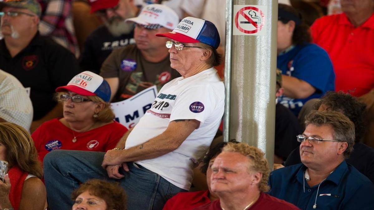 Supporters of Republican presidential candidate Donald Trump listen he speaks during a campaign rally, Wednesday, Oct. 12, 2016, in Ocala, Fla.