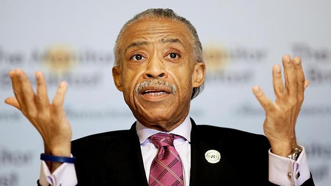 The Rev. Al Sharpton discusses Democratic and Republican presidential primary races with reporters in Washington, D.C.,Thursday at a breakfast hosted by the Christian Science Monitor.