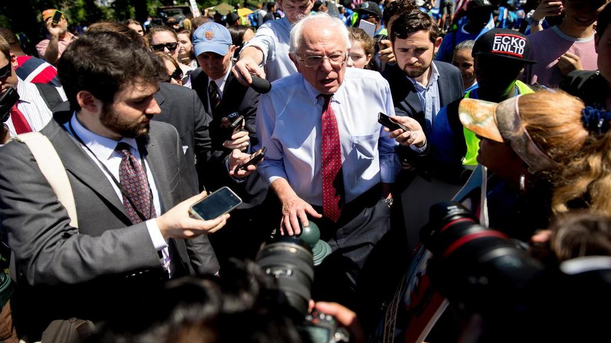 
Democratic presidential candidate Sen. Bernie Sanders, I-Vt., speaks to reporters after speaking to federal contract workers at a rally on Capitol Hill in Washington, Wednesday, July 22, 2015, to push for a raise to the minimum wage to $15 an hour.
