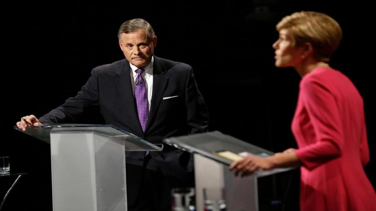 FILE – U.S. Sen. Richard Burr, R-N.C., left, and Democratic challenger Deborah Ross during a live televised Senate debate at UNC-TV studios in Research Triangle Park, N.C., Oct. 13, 2016. During the debate, both candidates said they’d consider using U.S. military ground troops in Syria to fight terrorism, and both favor safe zones there to alleviate the nation’s humanitarian crisis stemming from the ongoing conflict.