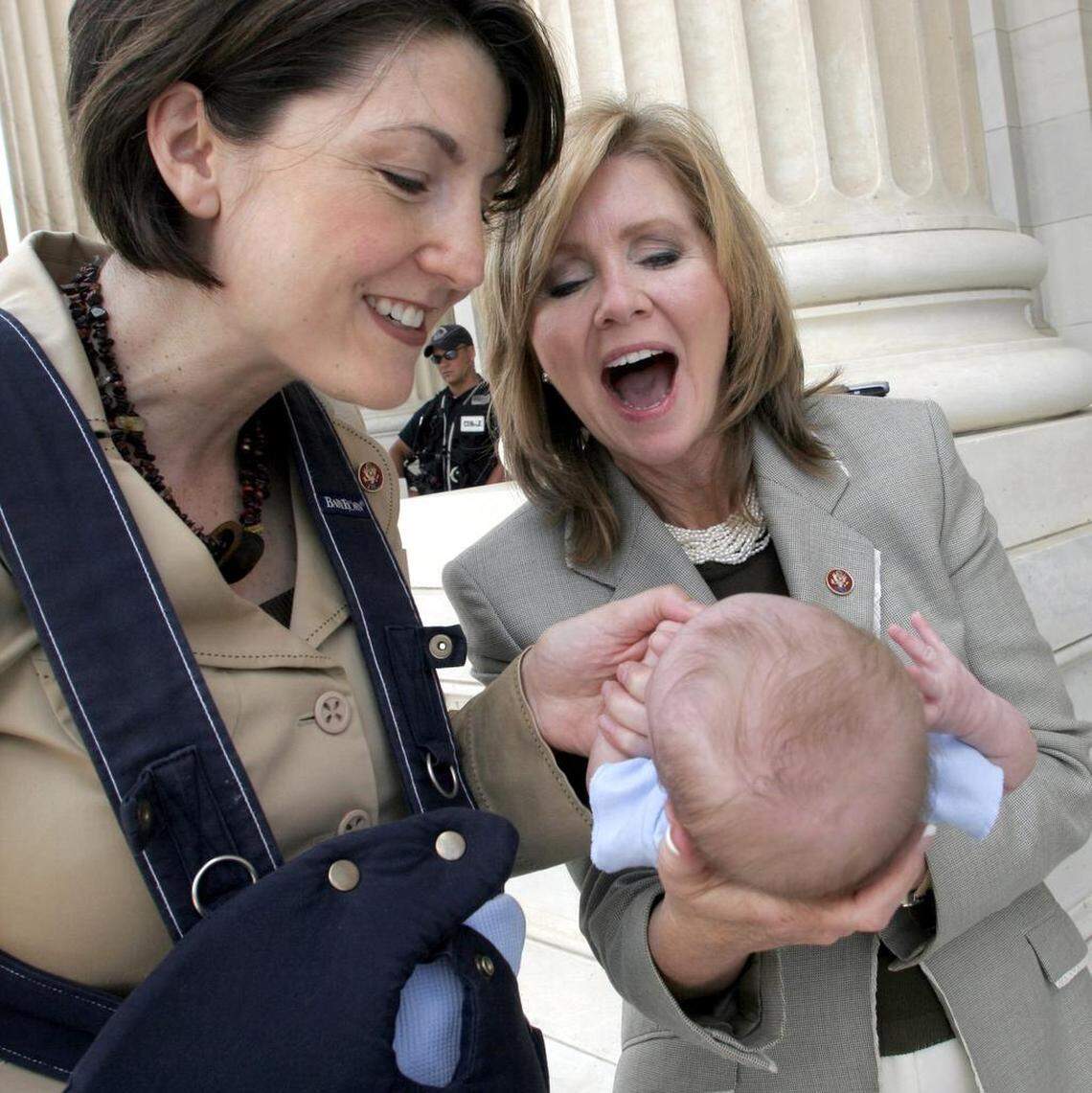 Rep. Cathy McMorris Rodgers, R-Wash., left, shows off her infant son Cole to Rep. Marsha Blackburn, R-Tenn., on Capitol Hill on July 19, 2007. Elected in 2004, McMorris Rodgers is the highest ranking Republican woman in Congress.