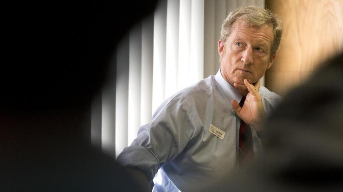 Tom Steyer listens during an event at McClatchy High School in Sacramento on Jan. 20, 2016.