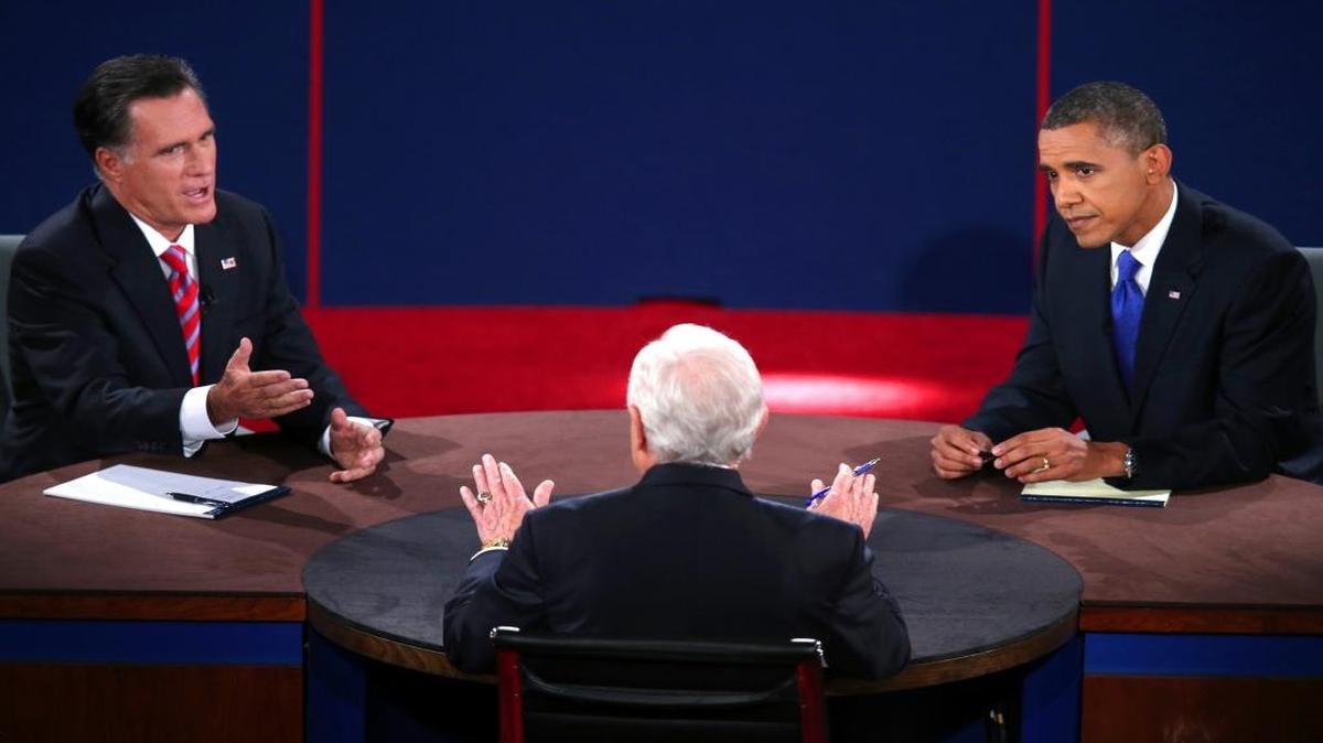 
Republican then-presidential-nominee Mitt Romney answers a question on Oct. 22, 2012, as President Barack Obama listens during the third presidential debate of that election season at Lynn University, in Boca Raton, Fla.
