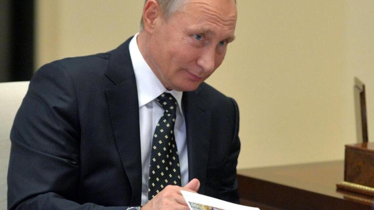 Russian President Vladimir Putin listens during a meeting in the Novo-Ogaryovo residence outside Moscow, Russia, on Monday, Nov. 14, 2016.
