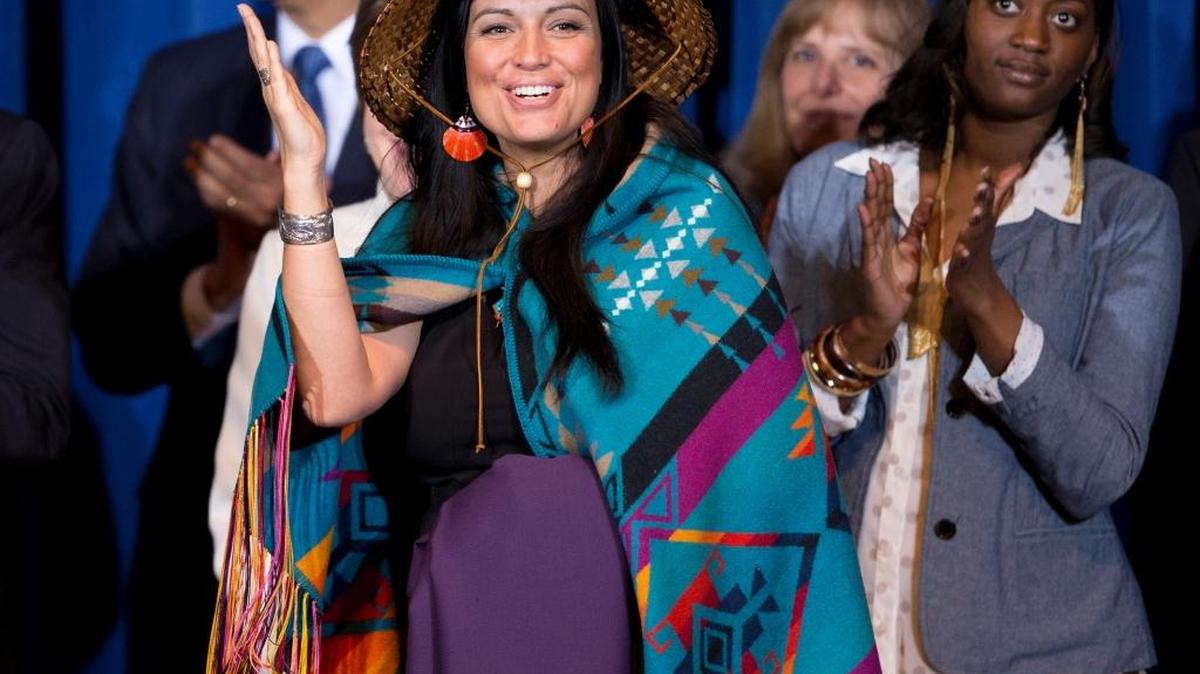 Deborah Parker, the former vice chairwoman of the Tulalip Tribes in Washington State, is featured in a new campaign ad sponsored by Democratic Sen. Patty Murray. Here she’s shown with former Attorney General Eric Holder, on left, and trafficking survivor and advocate Tysheena Rhames, on right, as President Barack Obama announces that he is signing the reauthorization of the Violence Against Women Act on March 7, 2013, at the Interior Department in Washington.