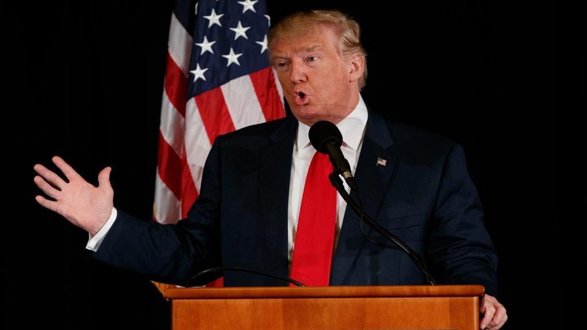 Republican presidential candidate Donald Trump speaks during a town hall with the Retired American Warriors on Monday, Oct. 3, 2016, in Herndon, Va.