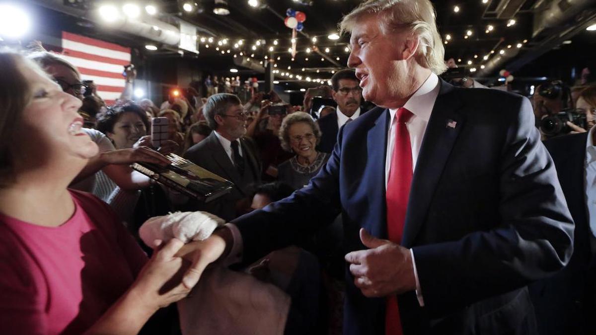 
Republican presidential candidate Donald Trump arrives at the National Federation of Republican Assemblies on Saturday, Aug. 29, 2015, in Nashville, Tenn. Thursday, he signed a pledge in New York to support whoever the GOP presidential nominee is and not to run a third-party campaign.

