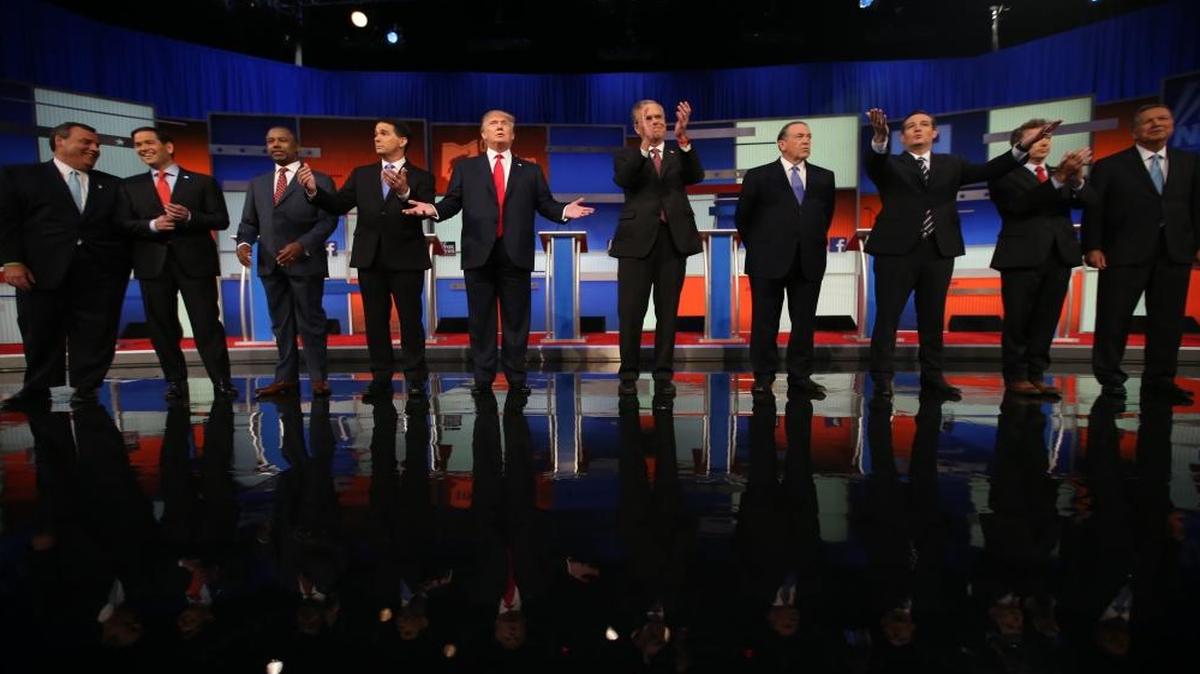 
Republican presidential candidates (from left) Chris Christie, Marco Rubio, Ben Carson, Scott Walker, Donald Trump, Jeb Bush, Mike Huckabee, Ted Cruz, Rand Paul, and John Kasich take the stage for the first Republican presidential debate at the Quicken Loans Arena Thursday, Aug. 6, 2015, in Cleveland.
