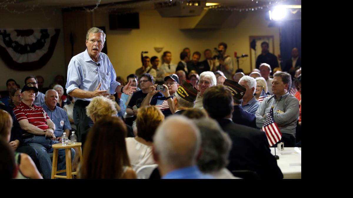 
Jeb Bush speakers during a town hall meeting Wednesday in Hudson, New Hampshire. His supporters Thursday reported raising more than $103 million to help his presidential bid. 

