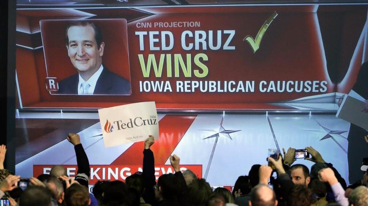Supporters cheer as returns are reported at Sen. Ted Cruz’s caucus night rally, Monday, Feb. 1, 2016, in Des Moines, Iowa.