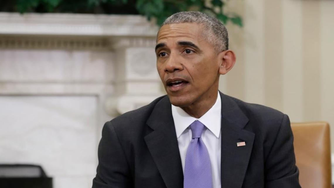 President Barack Obama talks to media at the start of a meeting with business, government and national security leaders in the Oval Office of the White House in Washington on Friday, Sept. 16, 2016, to discuss how the Trans-Pacific Partnership can benefit American workers and businesses and further national security.