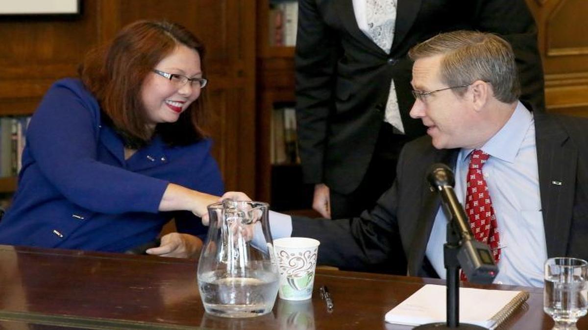 U.S. Senate candidates Rep. Tammy Duckworth and Sen. Mark Kirk shake hands after their debate Oct. 3, 2016, in the Chicago Tribune editorial board room.