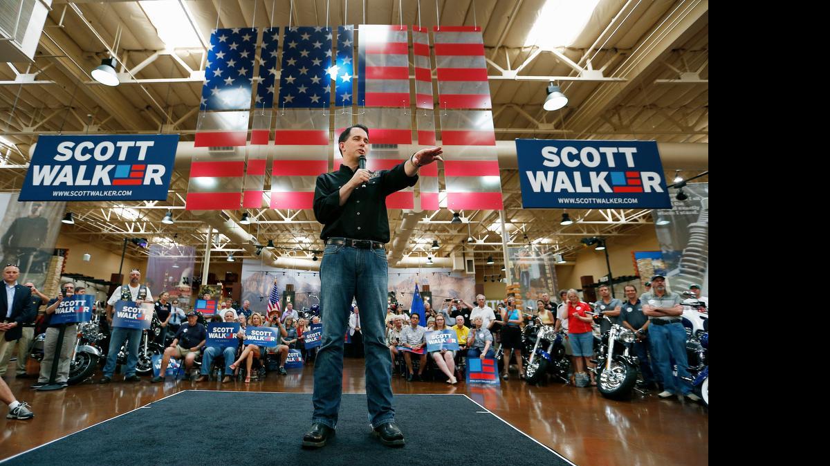 
Wisconsin Gov. Scott Walkers campaigns at a Harley-Davidson dealership Tuesday in Las Vegas.


