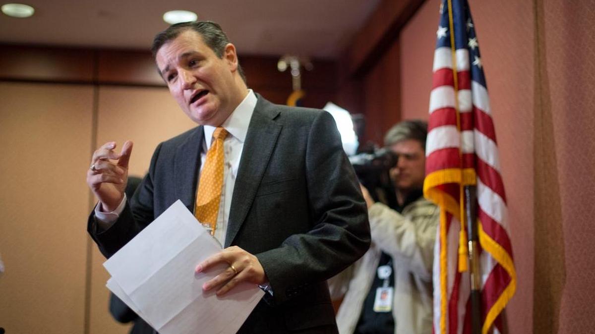 Presidential candidate Sen. Ted Cruz, R-Texas, answers a question from a member of the news media during a news conference on Capitol Hill in Washington on Tuesday, Dec. 8, 2015.
