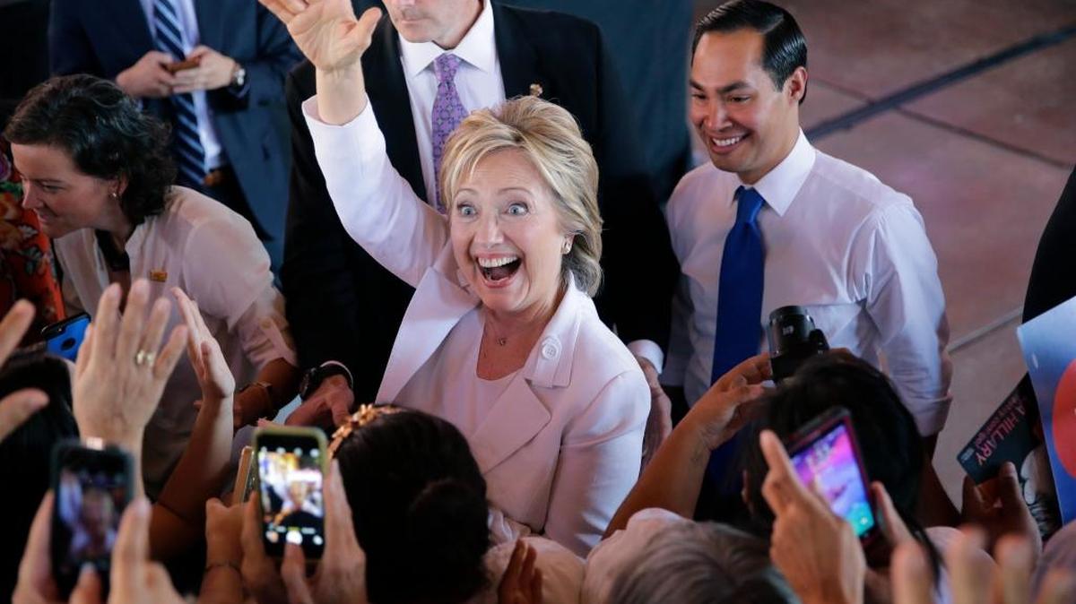 Democratic presidential candidate Hillary Rodham Clinton, left, and Housing and Urban Development Secretary Julian Castro, right, visit with supporters during a campaign event, Thursday, Oct. 15, 2015, in San Antonio.